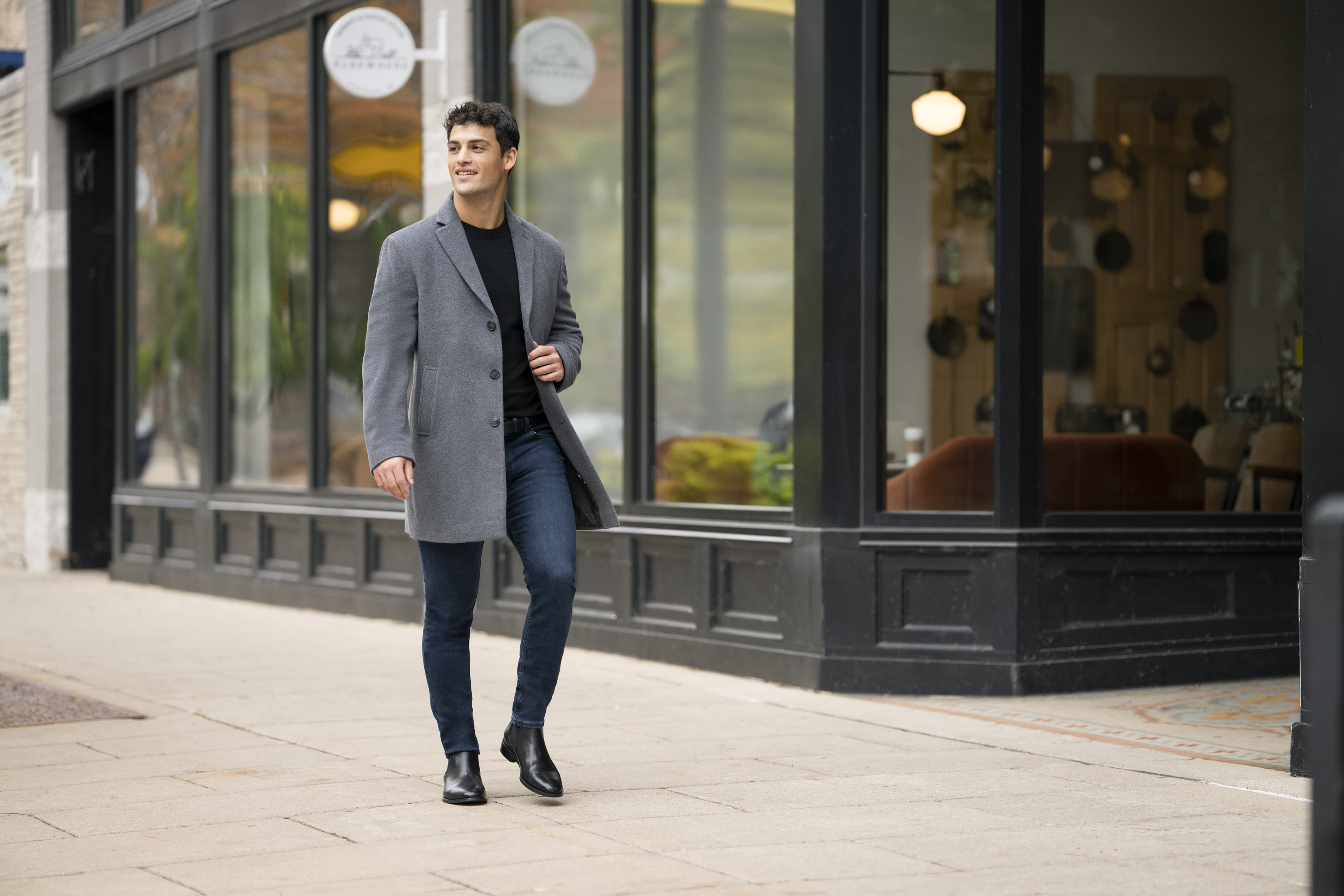 Must Have Boots for This Season Blog image featuring a man in a suit wearing Chadwick Chelsea Boots in Black.